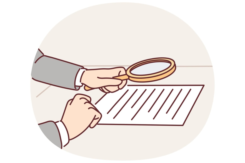 a lawyer observing a document through a magnifying glass