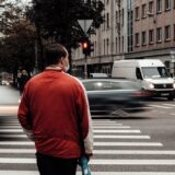 A car hit a person on a crosswalk